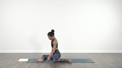 Yogi is practising yoga on a blue yoga mat on white background